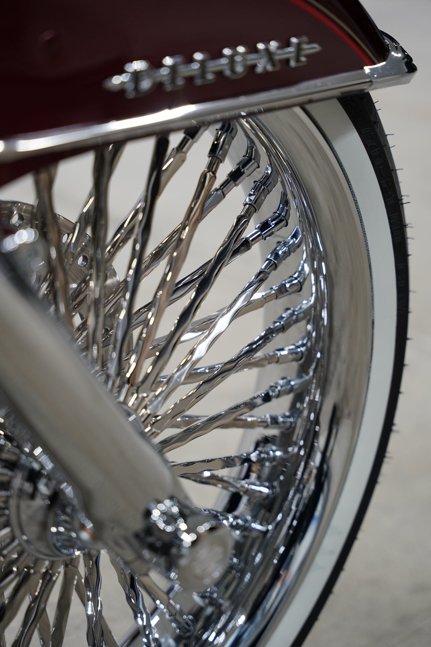 Softail Chrome Smooth Lip with Twisted Spokes